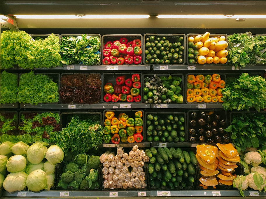 Colourful fruits and vegetables at a market - healthy plant-based eating