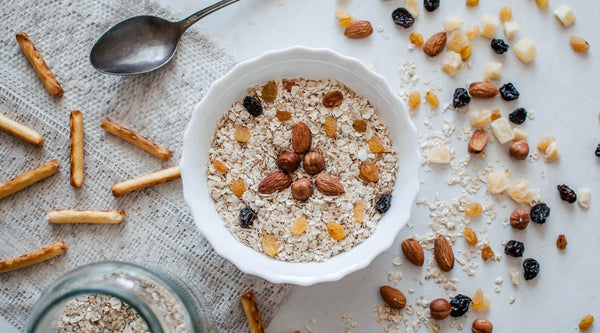 Nuts and granola cereal in a bowl - healthy vegetarian office snacks