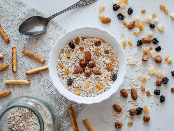 Nuts and granola cereal in a bowl - healthy vegetarian office snacks