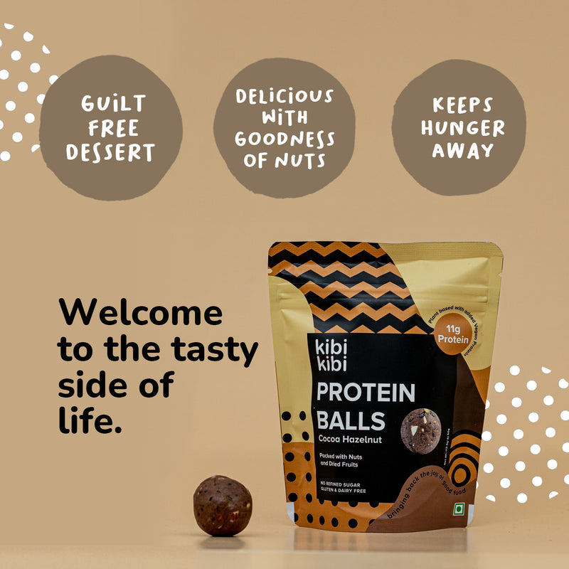 Cocoa Hazelnut protein balls showing dark cocoa coating and hazelnut pieces